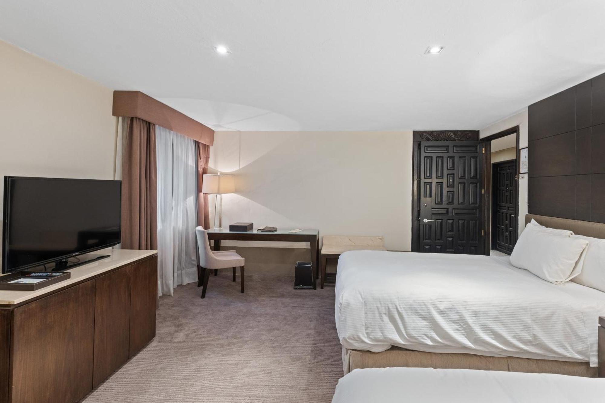 Quinta Real Puebla Hotell Eksteriør bilde A guest room at the Hilton Garden Inn